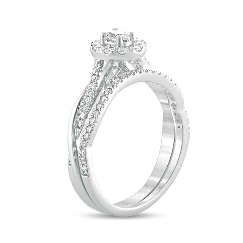 Main Image 2 of 1/2 CT. T.W. Oval Diamond Frame Twist Shank Bridal Set in 10K White Gold