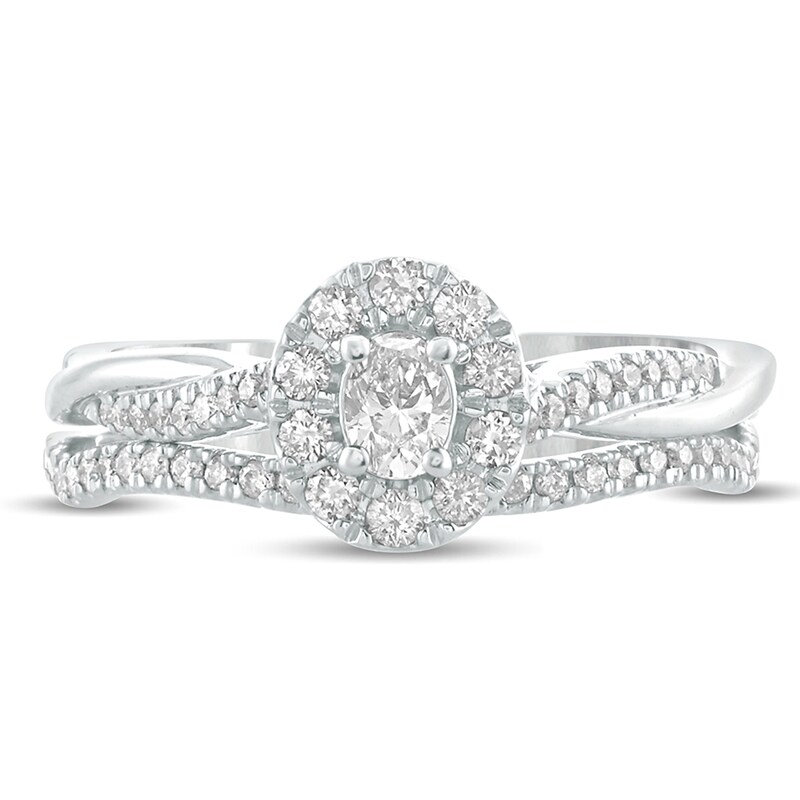 Main Image 3 of 1/2 CT. T.W. Oval Diamond Frame Twist Shank Bridal Set in 10K White Gold