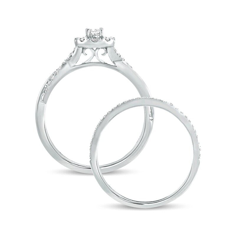Main Image 4 of 1/2 CT. T.W. Oval Diamond Frame Twist Shank Bridal Set in 10K White Gold