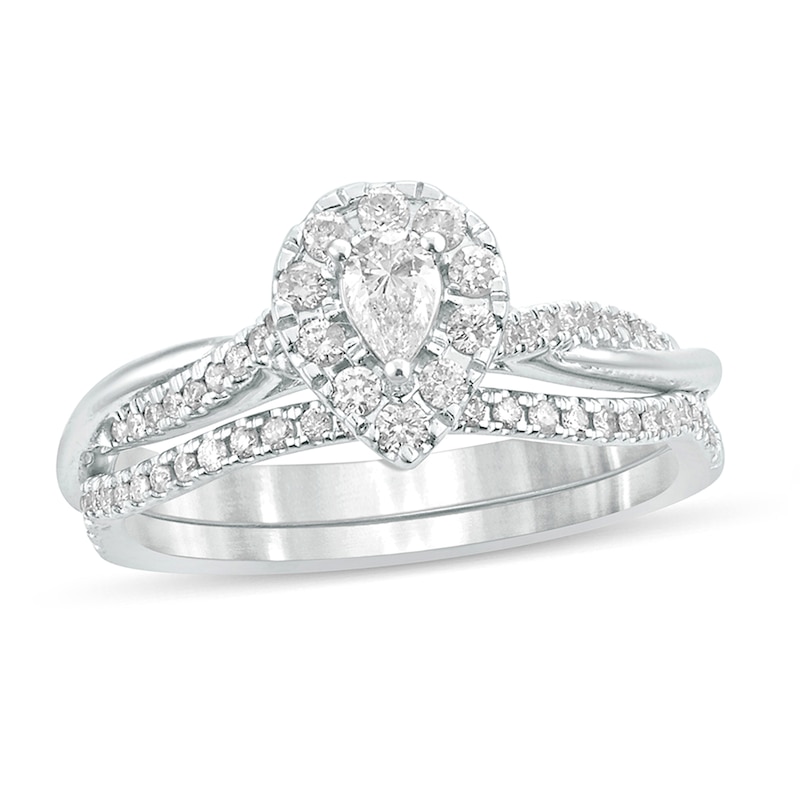 Main Image 1 of 1/2 CT. T.W. Pear-Shaped Diamond Frame Twist Shank Bridal Set in 10K White Gold