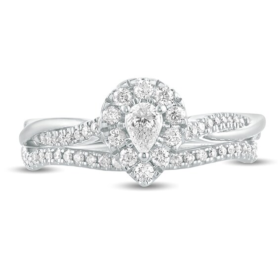 1/2 CT. T.w. Pear-Shaped Diamond Frame Twist Shank Bridal Set in 10K White Gold