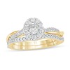 Thumbnail Image 1 of 1/2 CT. T.W. Oval Diamond Frame Twist Shank Bridal Set in 10K Gold