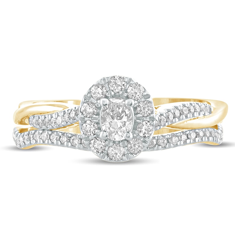 Main Image 3 of 1/2 CT. T.W. Oval Diamond Frame Twist Shank Bridal Set in 10K Gold