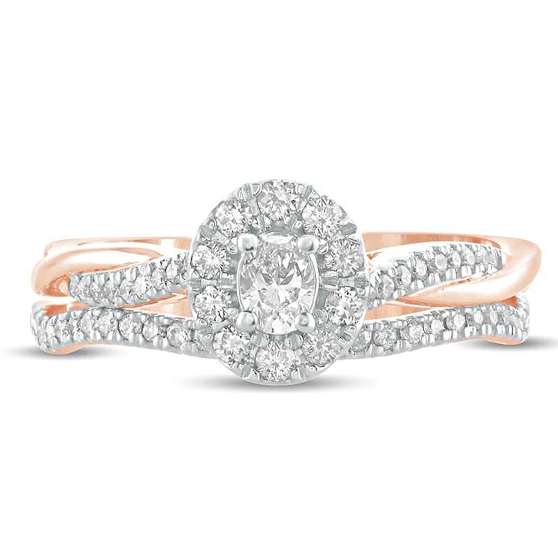 Main Image 3 of 1/2 CT. T.W. Oval Diamond Frame Twist Shank Bridal Set in 10K Rose Gold