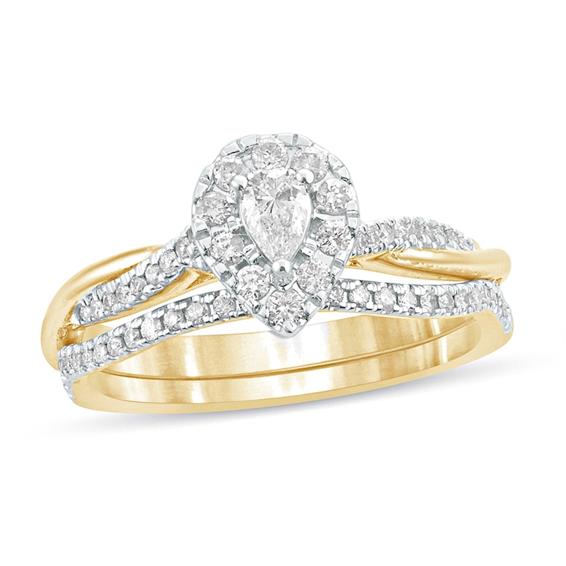 Main Image 1 of 1/2 CT. T.W. Pear-Shaped Diamond Frame Twist Shank Bridal Set in 10K Gold