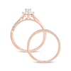1/2 CT. T.W. Pear-Shaped Diamond Frame Twist Shank Bridal Set in 10K Rose Gold