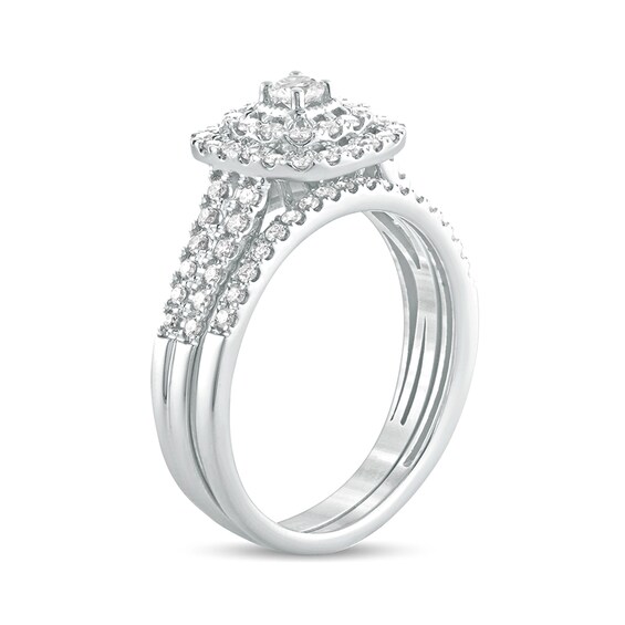 5/8 CT. T.w. Diamond Cushion Frame Split Shank Bridal Set in 10K White Gold