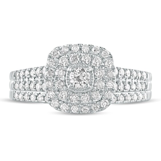 5/8 CT. T.w. Diamond Cushion Frame Split Shank Bridal Set in 10K White Gold