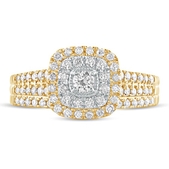 5/8 CT. T.w. Diamond Double Cushion Frame Multi-Row Bridal Set in 10K Gold