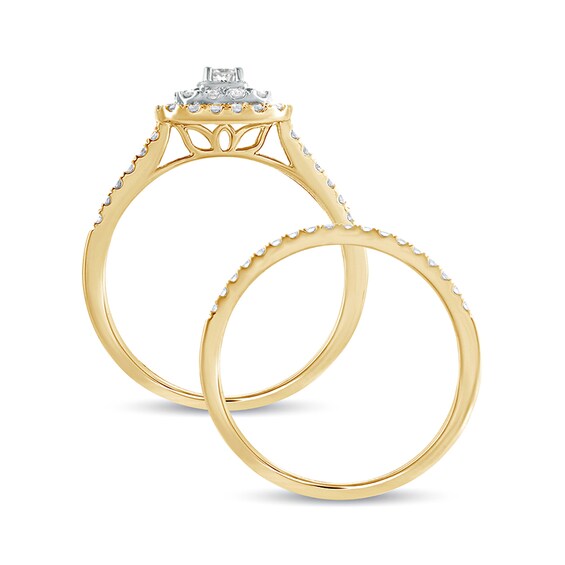 5/8 CT. T.w. Diamond Double Cushion Frame Multi-Row Bridal Set in 10K Gold