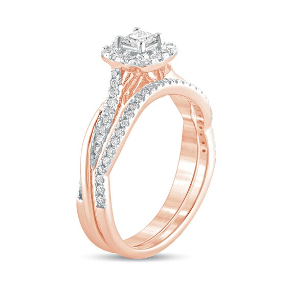 1/2 CT. T.w. Princess-Cut Diamond Frame Twist Shank Bridal Set in 10K Rose Gold