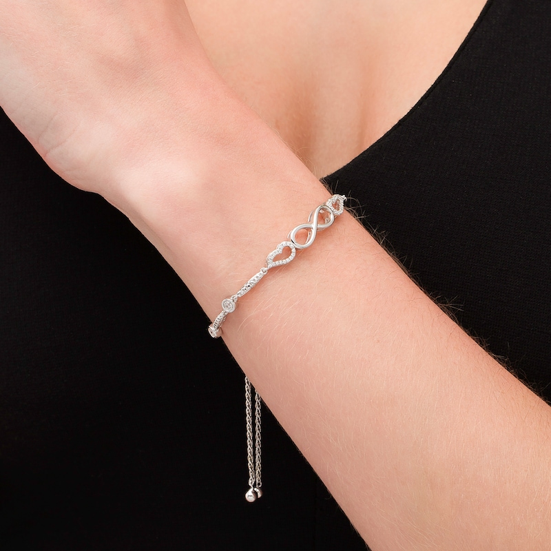Main Image 2 of 1/4 CT. T.W. Diamond Sideways Infinity Angel Wings Bolo Bracelet in Sterling Silver - 9"