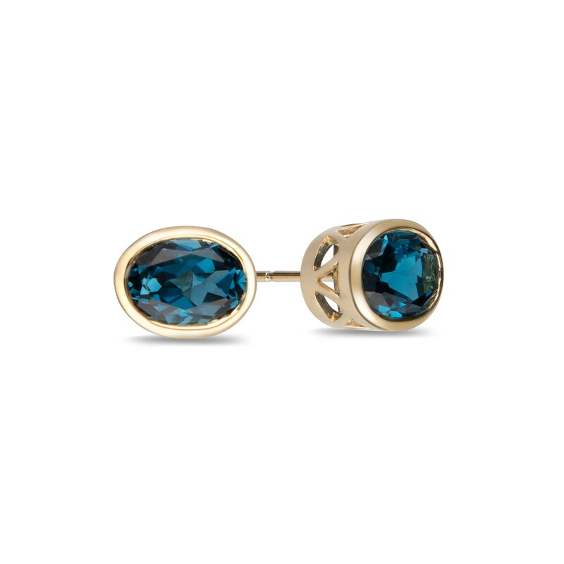 Oval London Blue Topaz Solitaire Stud Earrings in 10K Gold