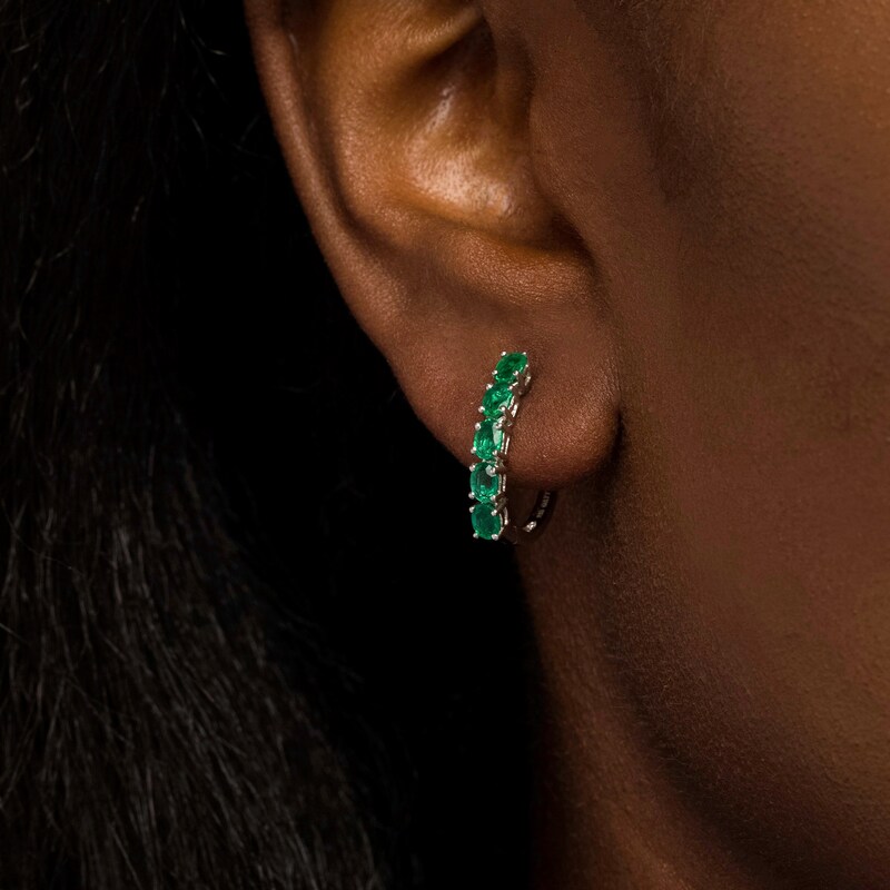 Oval Emerald Huggie Hoop Earrings in Sterling Silver
