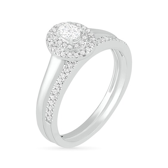 3/8 CT. T.w. Oval Diamond Double Frame Bridal Set in 10K White Gold