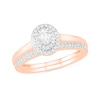 Thumbnail Image 0 of 3/8 CT. T.W. Oval Diamond Double Frame Bridal Set in 10K Rose Gold