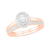 Thumbnail Image 1 of 3/8 CT. T.W. Oval Diamond Double Frame Bridal Set in 10K Rose Gold
