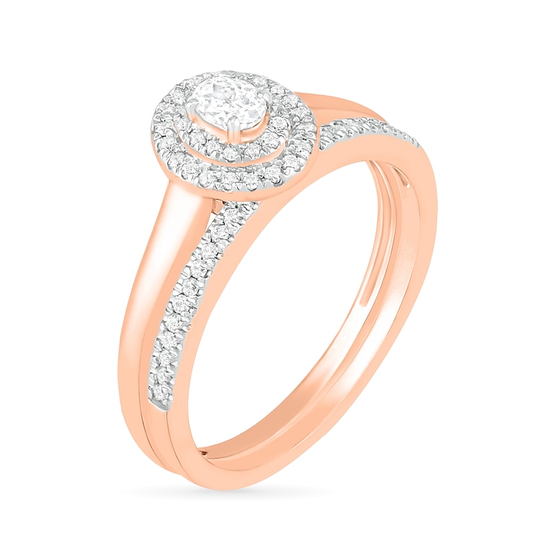 3/8 CT. T.W. Oval Diamond Double Frame Bridal Set in 10K Rose Gold