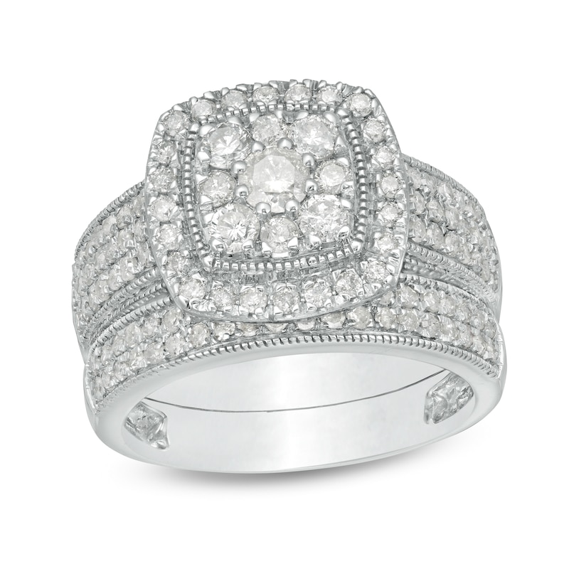 Main Image 1 of 1-1/3 CT. T.W. Cushion Multi-Diamond Frame Multi-Row Vintage-Style Bridal Set in 10K White Gold