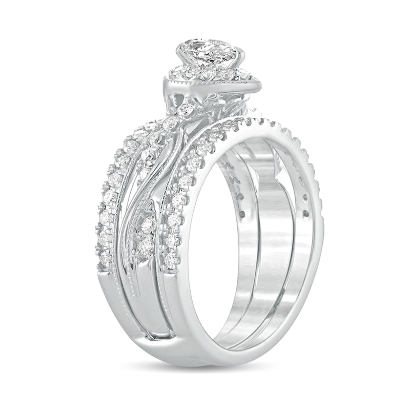 1 CT. T.W. Pear-Shaped Diamond Frame Twist Shank Vintage-Style Bridal Set in 14K White Gold