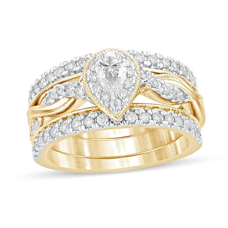 Main Image 1 of 1 CT. T.W. Pear-Shaped Diamond Frame Twist Shank Vintage-Style Bridal Set in 14K Gold