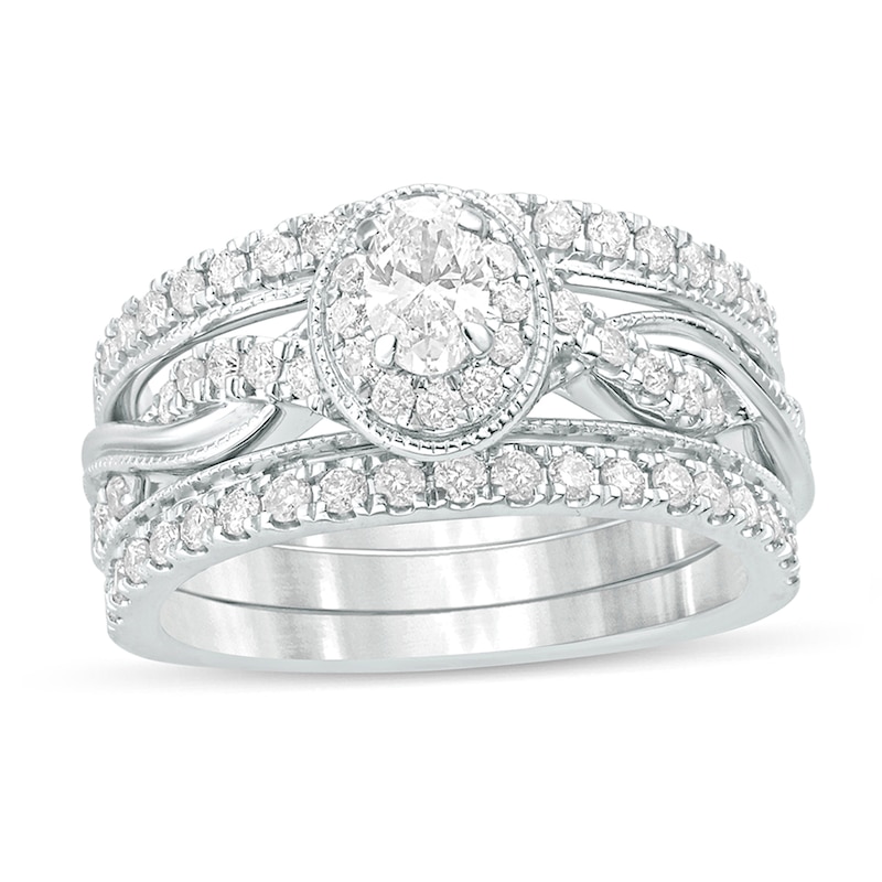 Main Image 1 of 1 CT. T.W. Oval Diamond Frame Twist Shank Vintage-Style Bridal Set in 14K White Gold