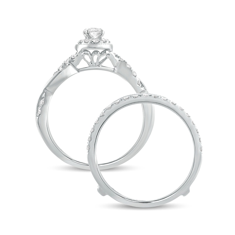 Main Image 4 of 1 CT. T.W. Oval Diamond Frame Twist Shank Vintage-Style Bridal Set in 14K White Gold