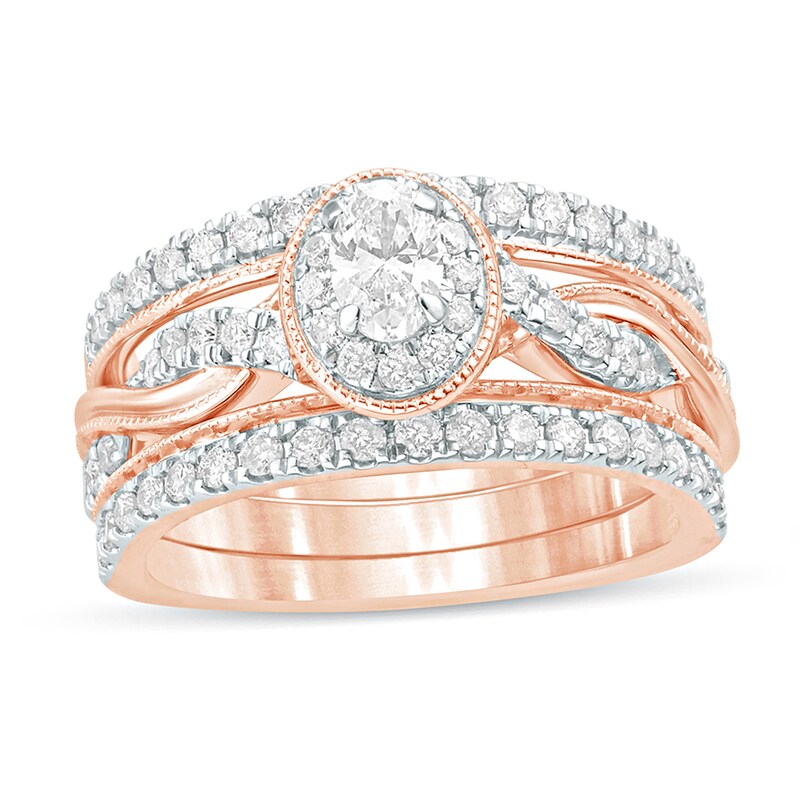 Main Image 1 of 1 CT. T.W. Oval Diamond Frame Twist Shank Vintage-Style Bridal Set in 14K Rose Gold