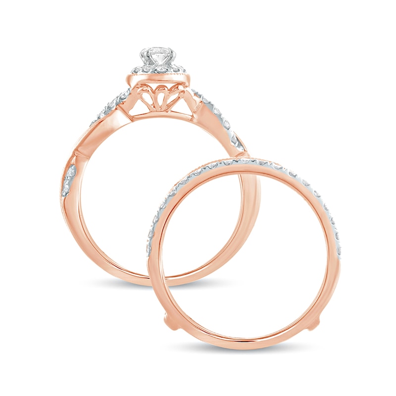 Main Image 4 of 1 CT. T.W. Oval Diamond Frame Twist Shank Vintage-Style Bridal Set in 14K Rose Gold
