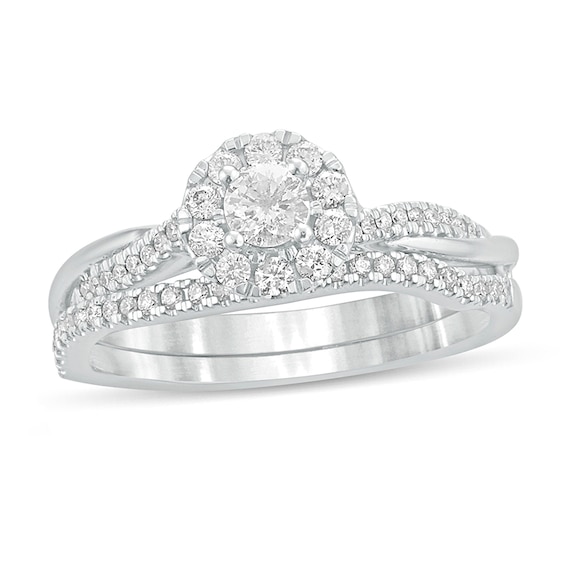 1/2 CT. T.w. Diamond Frame Twist Shank Bridal Set in 10K White Gold