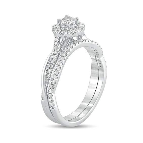 1/2 CT. T.w. Diamond Frame Twist Shank Bridal Set in 10K White Gold
