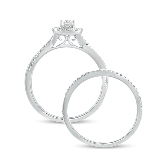 1/2 CT. T.w. Diamond Frame Twist Shank Bridal Set in 10K White Gold