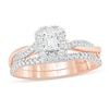 Thumbnail Image 1 of 1/2 CT. T.W. Emerald-Cut Diamond Frame Twist Shank Bridal Set in 10K Rose Gold