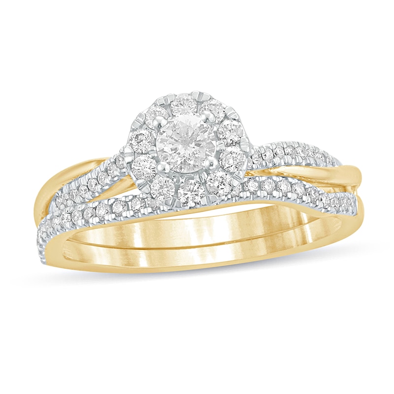Main Image 1 of 1/2 CT. T.W. Diamond Frame Twist Shank Bridal Set in 10K Gold