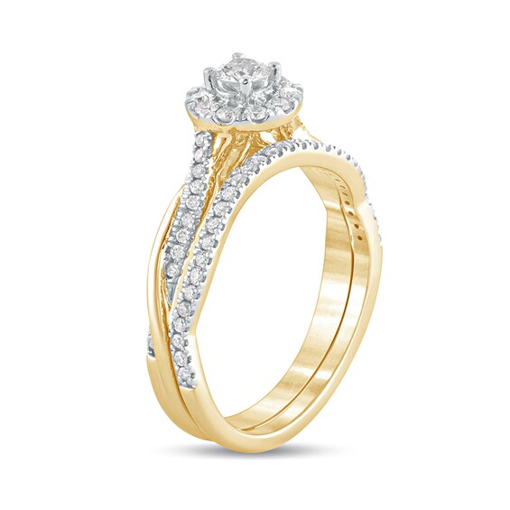 1/2 CT. T.w. Diamond Frame Twist Shank Bridal Set in 10K Gold