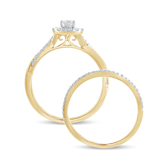 1/2 CT. T.w. Diamond Frame Twist Shank Bridal Set in 10K Gold