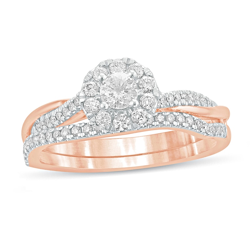 Main Image 1 of 1/2 CT. T.W. Diamond Frame Twist Shank Bridal Set in 10K Rose Gold