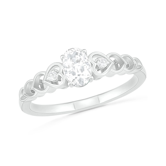 Oval Lab-Created White Sapphire and Diamond Accent Heart-Sides Trio Ring in Sterling Silver Oval Lab-Created White Sapphire and Diamond Accent Heart-Sides Trio Ring in Sterling Silver