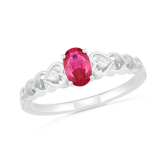 Oval Lab-Created Ruby and Diamond Accent Heart-Sides Trio Ring in Sterling Silver Oval Lab-Created Ruby and Diamond Accent Heart-Sides Trio Ring in Sterling Silver