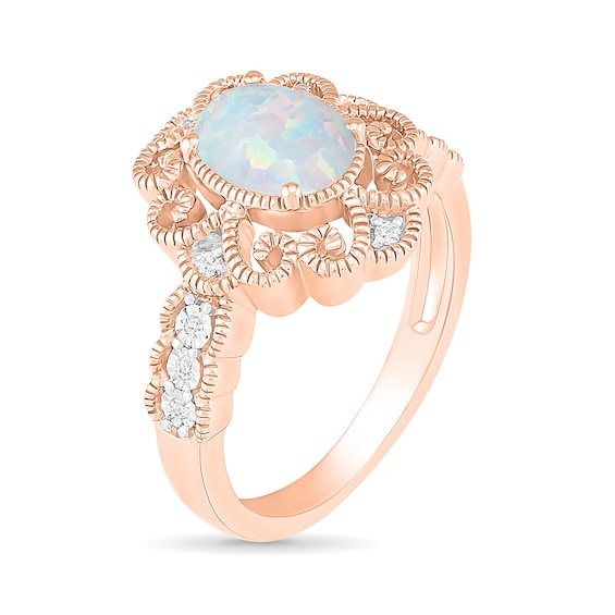 Oval Lab-Created Opal and 1/20 CT. T.W. Diamond Scroll Frame Scallop Shank Vintage-Style Ring in 10K Rose Gold Oval Lab-Created Opal and 1/20 CT. T.W. Diamond Scroll Frame Scallop Shank Vintage-Style Ring in 10K Rose Gold