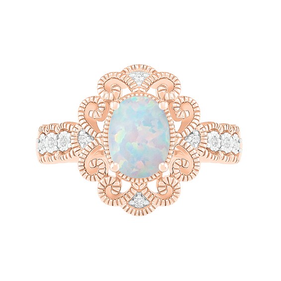 Oval Lab-Created Opal and 1/20 CT. T.W. Diamond Scroll Frame Scallop Shank Vintage-Style Ring in 10K Rose Gold Oval Lab-Created Opal and 1/20 CT. T.W. Diamond Scroll Frame Scallop Shank Vintage-Style Ring in 10K Rose Gold