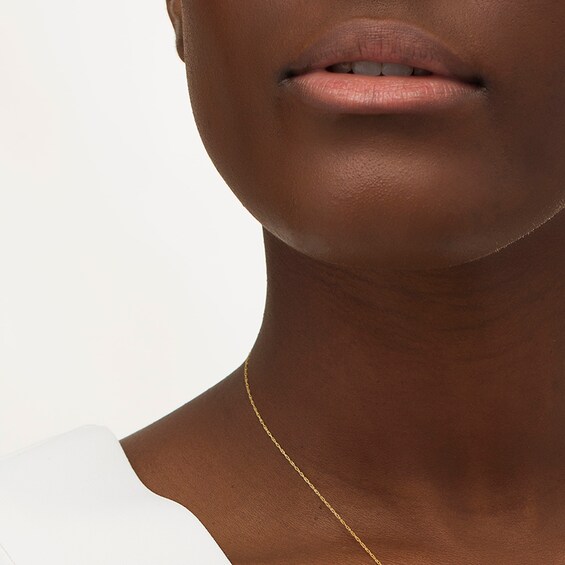Remixed Reimagined 1/4 CT. T.w. Diamond Cross Pendant in 10K Gold