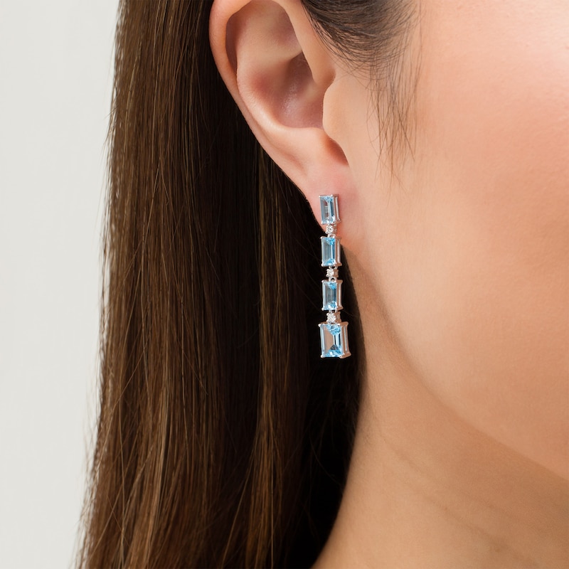 Main Image 3 of Marilyn Monroe™ Collection Baguette Swiss Blue Topaz and 1/8 CT. T.W. Diamond Linear Drop Earrings in Sterling Silver