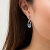 Thumbnail Image 3 of Marilyn Monroe™ Collection Oval Swiss Blue Topaz and 1/4 CT. T.W. Diamond Frame Teardrop Earrings in Sterling Silver