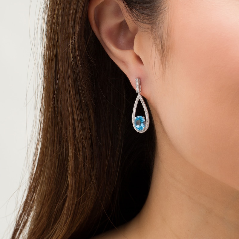Main Image 3 of Marilyn Monroe™ Collection Oval Swiss Blue Topaz and 1/4 CT. T.W. Diamond Frame Teardrop Earrings in Sterling Silver