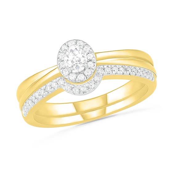 1/3 CT. T.w. Oval Diamond Frame Bridal Set in 10K Gold