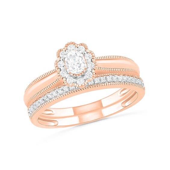 1/3 CT. T.W. Oval Diamond Scallop Frame Vintage-Style Bridal Set in 10K Rose Gold 1/3 CT. T.W. Oval Diamond Scallop Frame Vintage-Style Bridal Set in 10K Rose Gold