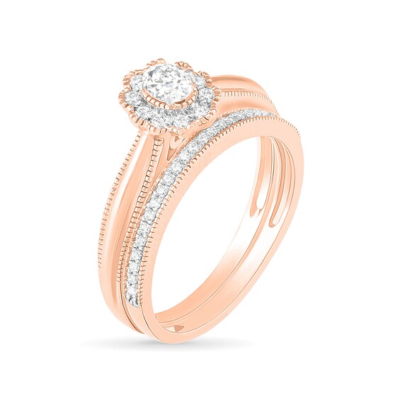 1/3 CT. T.W. Oval Diamond Scallop Frame Vintage-Style Bridal Set in 10K Rose Gold 1/3 CT. T.W. Oval Diamond Scallop Frame Vintage-Style Bridal Set in 10K Rose Gold