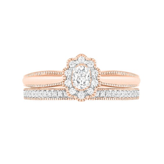 1/3 CT. T.W. Oval Diamond Scallop Frame Vintage-Style Bridal Set in 10K Rose Gold 1/3 CT. T.W. Oval Diamond Scallop Frame Vintage-Style Bridal Set in 10K Rose Gold