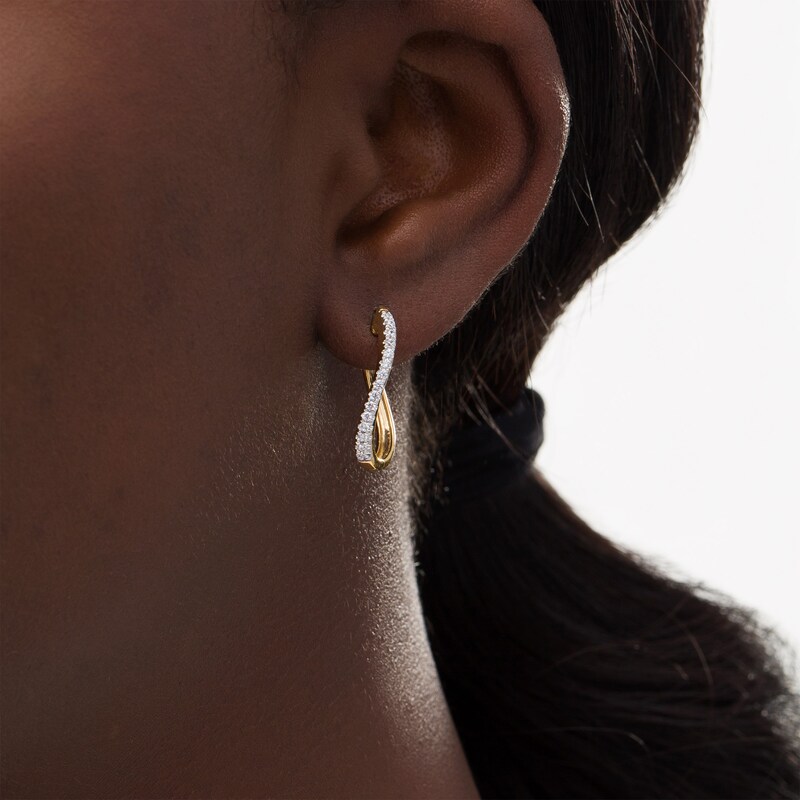 Main Image 2 of 1/4 CT. T.W. Diamond Wavy Hoop Earrings in 10K Gold
